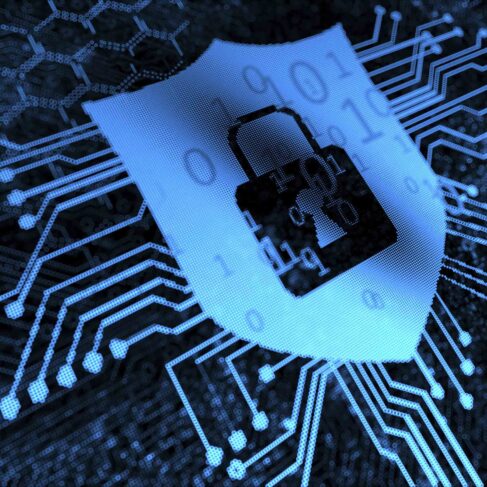 Computer screen image showing a shield with a locked padlock in the middle with circuits extending from the shield