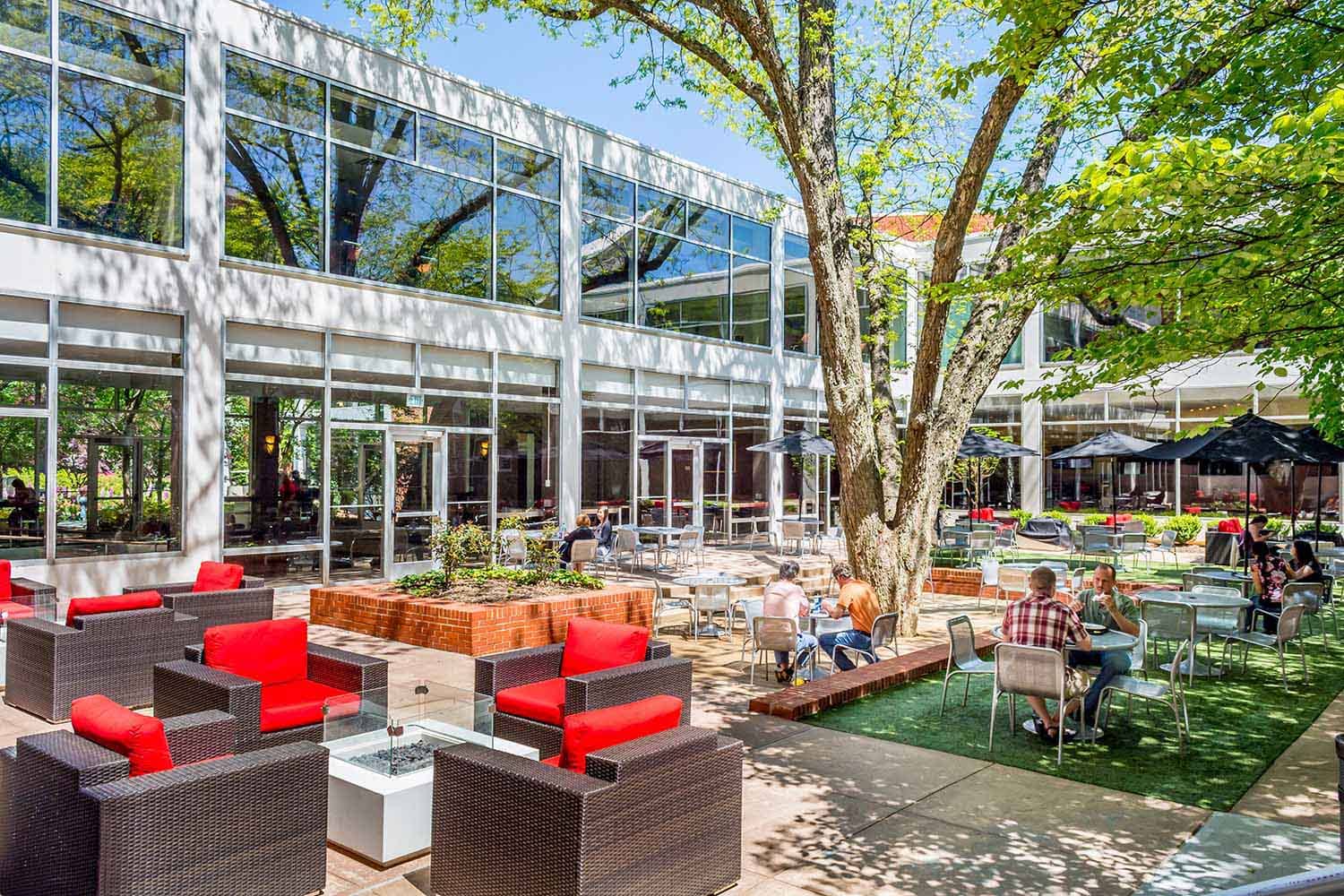 View of the Pecan Tree Courtyard with customers visiting and relaxing