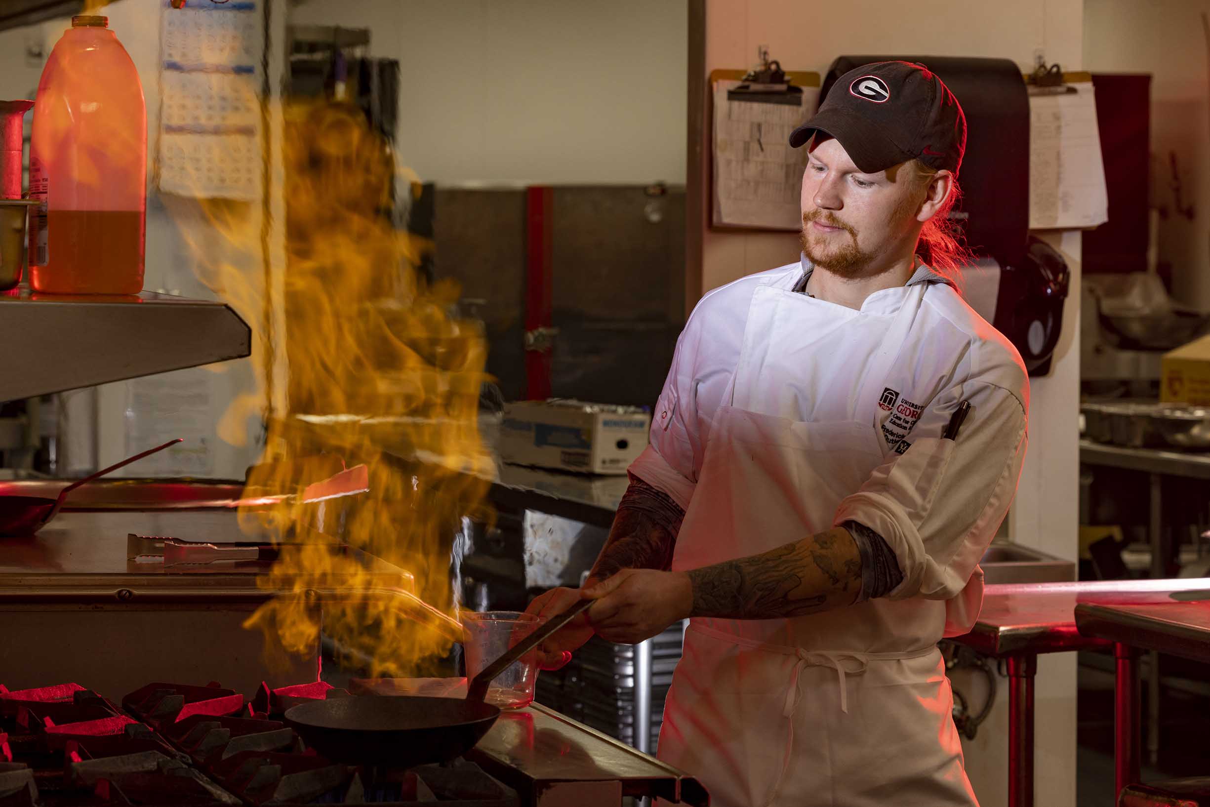 Outlet chef Fred Chabra prepares food in the dining services kitchen at the Georgia Center.