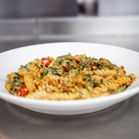 bowl of a pasta meal on a white dish