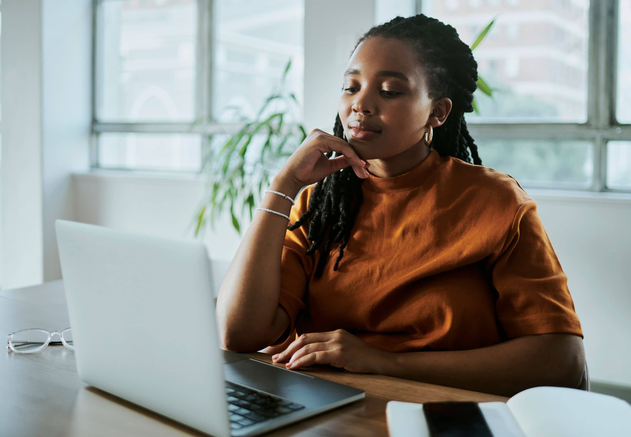A business woman working on her laptop computer.
