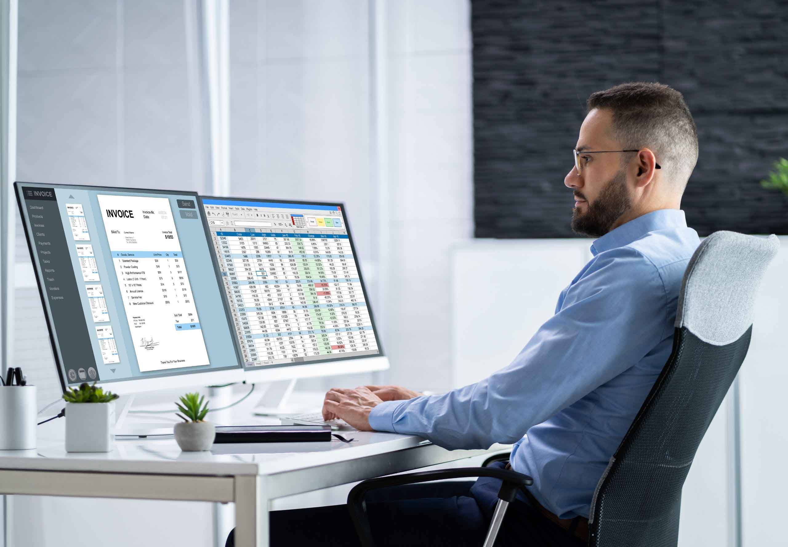 A person working with a digital electronic billing system and an invoice on his monitors.