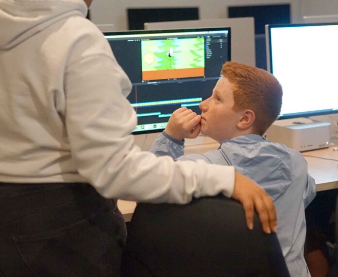 Student looking at a computer screen