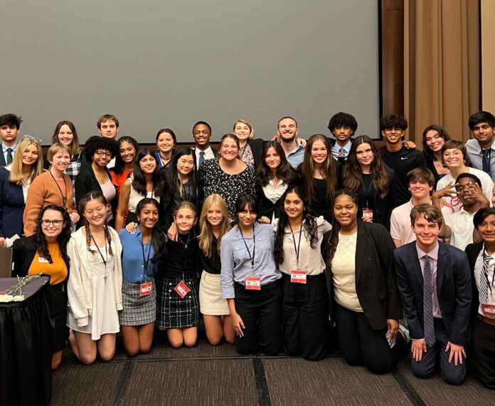 A group of students attending Mock Trial Academy
