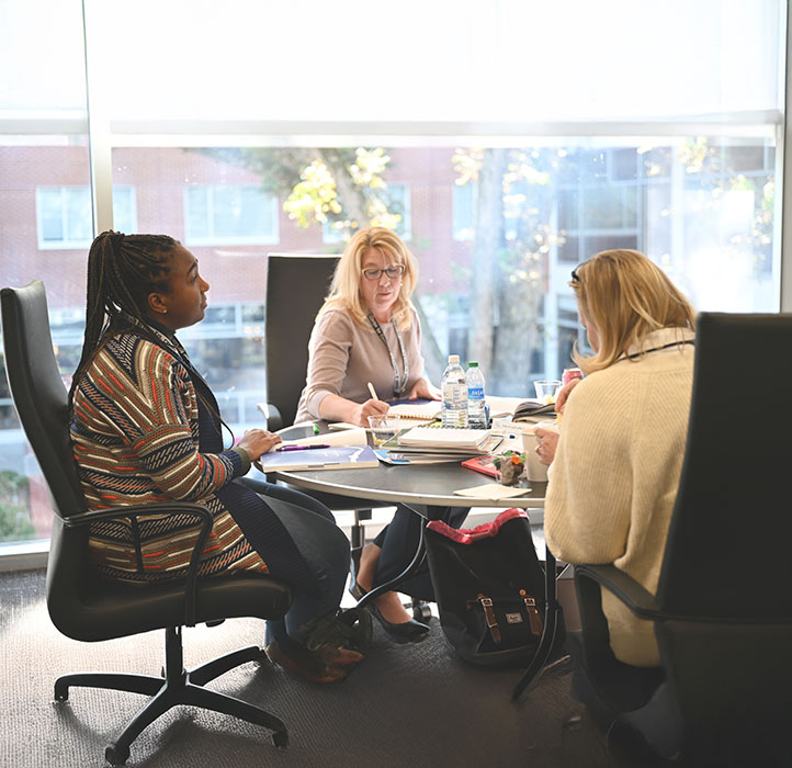 three women participate in continuing education program at the Georgia Center.