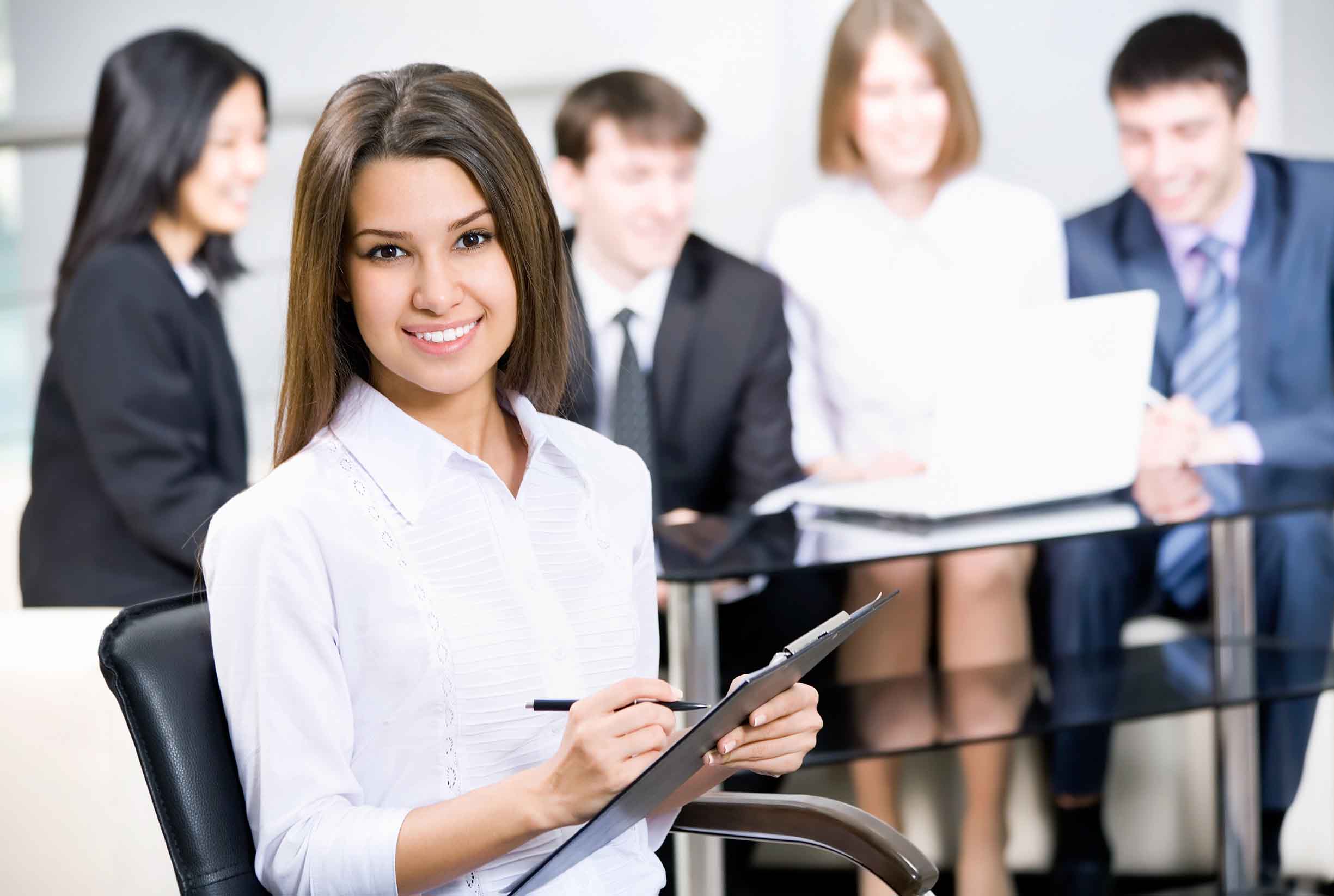 Young business woman and her team