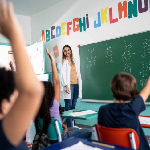Teacher teaching students in the classroom