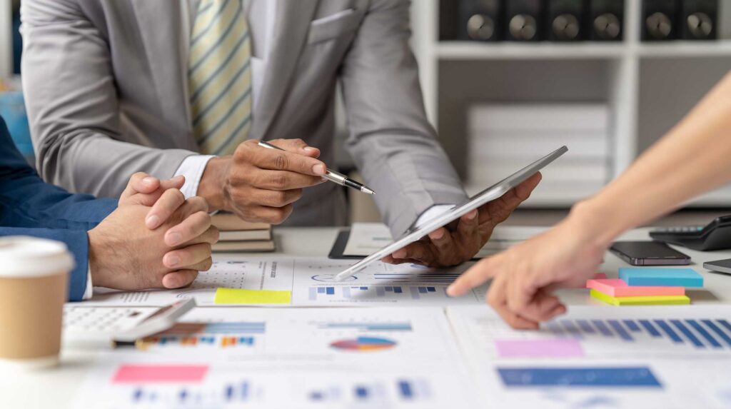 Team of business consultants analyzing research data