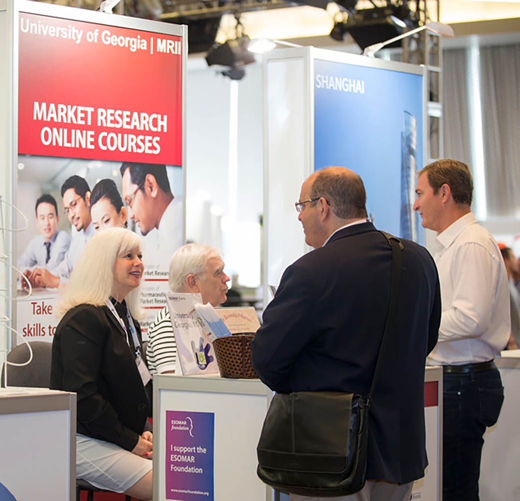 Pam at a conference in New Orleans talking to two people who are interested in Market Research. Contact Pam Bracken to learn more.