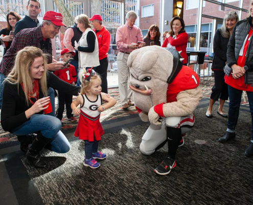 Hairy Dawg greeting guests at the UGA Hotel